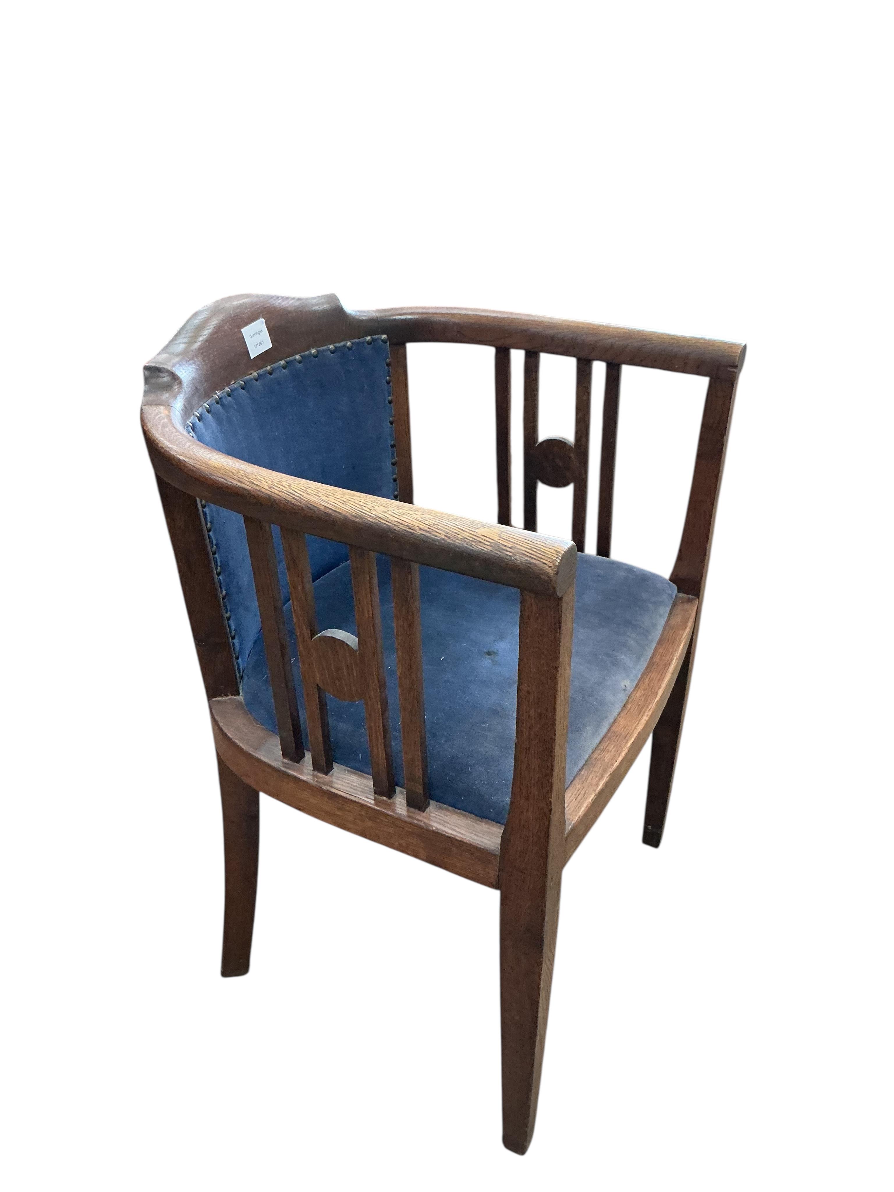 An early 20th century tub framed oak chair, width 60cm, depth 46cm, height 78cm